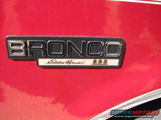Red 1994 Ford Bronco Eddie Bauer emblem on side panel