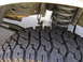 1994 Ford Bronco - This image shows a close-up of a vehicle's tire and suspension system, not a full view of a 1994 Ford Bronco.