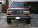 1994 Ford Bronco - This 1994 Ford Bronco is presented in a front-facing view, its chrome grille and a clear license plate.