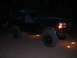 1994 Ford Bronco - This 1994 Ford Bronco is equipped with large off-road tires and underglow lighting.