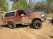 1994 Ford Bronco - This 1994 Ford Bronco is covered in mud after off-roading.