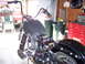2000 Harley-Davidson Softail - Motorcycle in garage, possibly undergoing maintenance or customization.