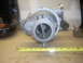 1991 Ford Mustang - Turbocharger and wastegate shown with a measuring tape for scale.