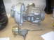 1991 Ford Mustang - Turbocharger and wastegate assembly shown on a workbench surface.