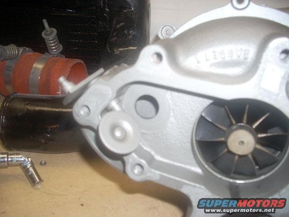 turbocharger housing with fan visible