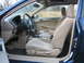 2001 Honda Civic - Interior view of a blue 2001 Honda Civic, showing the driver's seat, dashboard, and center console.