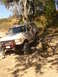 1989 Ford Bronco - This 1980s Ford Bronco is shown off-roading on a dirt and rock path.