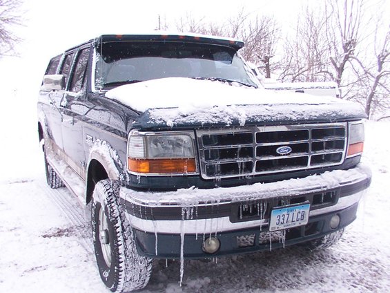 1995 Ford C-350 (Centurion Conversions) front grille covered in snow and icicles