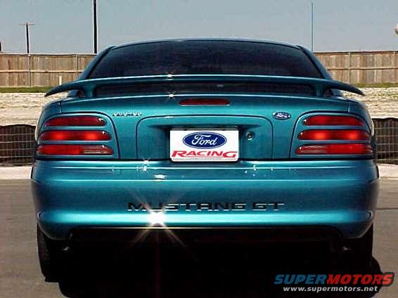 Rear of teal 1994 Ford Mustang GT with Ford Racing plate