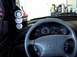 1994 Ford Mustang - Aftermarket gauges are mounted on the pillar inside a 1994 Ford Mustang GT.