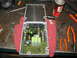1995 Ford C-350 (Centurion Conversions) - An open electronic control unit is shown on a workbench with various tools scattered around it.