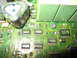 1995 Ford C-350 (Centurion Conversions) - This is a close-up view of a circuit board, showing electronic components like integrated circuits and capacitors.