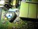 1995 Ford C-350 (Centurion Conversions) - A detailed view of electronic components on a circuit board, a distinctive triangular capacitor.