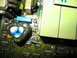 1995 Ford C-350 (Centurion Conversions) - Close-up of electronic components on a green circuit board, including capacitors and resistors.