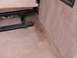1995 Ford C-350 (Centurion Conversions) - Stain on the carpet of a vehicle's interior, near the seat base.