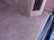 1995 Ford C-350 (Centurion Conversions) - Close-up of the carpeted interior and an air vent.