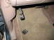 1995 Ford C-350 (Centurion Conversions) - The pedal assembly is broken and detached from its mounting bracket inside the vehicle's interior.