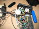 1995 Ford C-350 (Centurion Conversions) - Disassembled overhead console wiring harness showing various connectors and tangled wires.