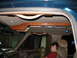 1995 Ford C-350 (Centurion Conversions) - The overhead console of a 1995 Ford C-350 Centurion Conversions shows wood trim and exposed wiring.