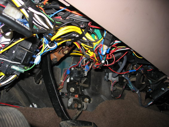 Vehicle's interior wiring harness with many colorful wires and connectors