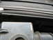 1995 Ford C-350 (Centurion Conversions) - Detail of engine components, including a black corrugated hose.