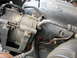 1995 Ford C-350 (Centurion Conversions) - Engine bay detail showing an AC compressor and a turbo diesel engine cover.