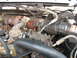 1995 Ford C-350 (Centurion Conversions) - Close-up view of an engine bay, highlighting the turbocharger and associated intake plumbing.