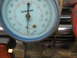 1995 Ford C-350 (Centurion Conversions) - AC manifold gauge set with readings visible, part of a diagnostic tool.