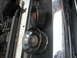 1995 Ford C-350 (Centurion Conversions) - Close-up of an idler pulley, possibly from a Ford vehicle, with a visible F5TE part number.
