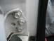 1995 Ford C-350 (Centurion Conversions) - The photo shows the bolts securing the door hinge to the vehicle's frame.