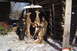 2002 Suzuki VL 1500 Intruder Classic - Two hunters pose with their deer harvest, hoisted for display and processing in a barn.