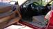 1996 Ford Probe - The interior of a 1996 Ford Probe shows tan leather seats and a black dashboard.