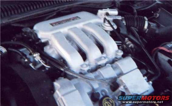 intakeman.jpg Close up of the silver intake manifold. Looks so much better than the 2000+ black plastic manifold.