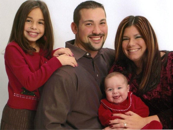 Family posing for a portrait