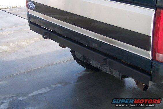 Rear view of a 1995 Ford Bronco with a custom bumper and tow hitch