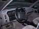 1994 Jeep Grand Cherokee - The interior of a Jeep SUV is shown, the dashboard, steering wheel, and seats.