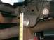 1996 Ford Bronco - Another shot of the rear hanger, image out of foucus but it shows the center of where we redrilled the stock hanger. Lo…