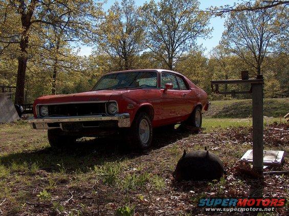 Red 1973 Chevrolet Nova coupe, 3/4 front view