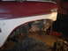 1986 Ford Bronco - Front fender removed from a 1986 Ford Bronco to access the suspension components.