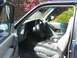 1991 Ford Explorer - The interior of a 1991 Ford Explorer is visible, with gray seats and a dark dashboard.