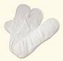 Three white sanitary pads arranged in a pile
