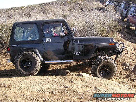 Black Jeep in Ditch