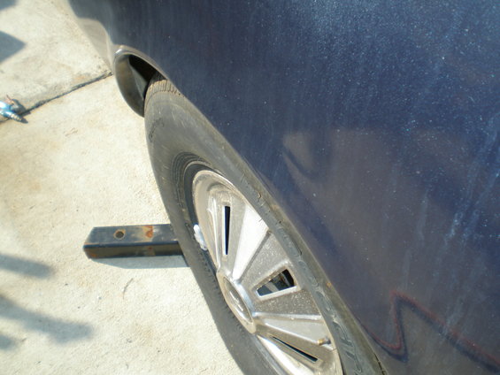 1966 Ford Mustang rear wheel and fender, dark blue