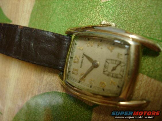 Close-up of a vintage Hamilton watch with a brown leather strap