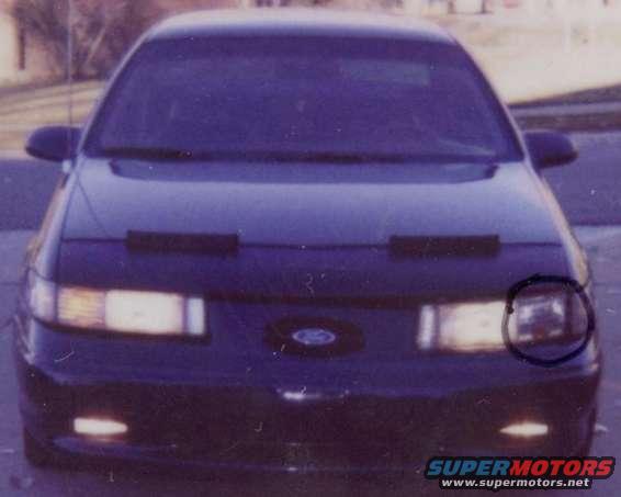 accident1.jpg In this pic, you basically can only see that the light fell out, and that the hood is bent at the lip.