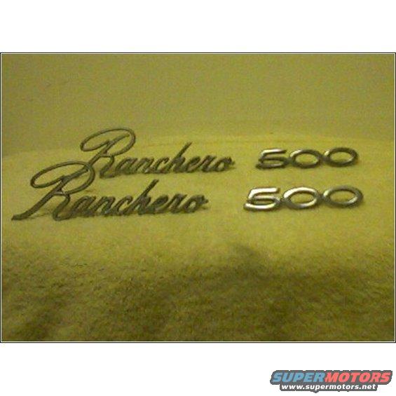 Two Ranchero emblems and two 500 emblems on a fuzzy surface