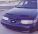 1994 Ford Taurus - In this pic, you can really see that the hood is bent, and that the light's mounts are broken (as the light is crooked)