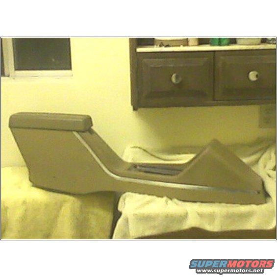 tan center console with armrest