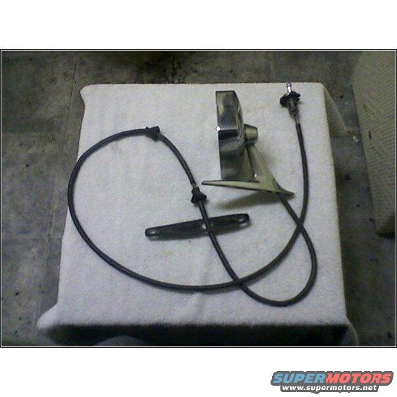 Car side mirror assembly with attached cable and mounting bracket