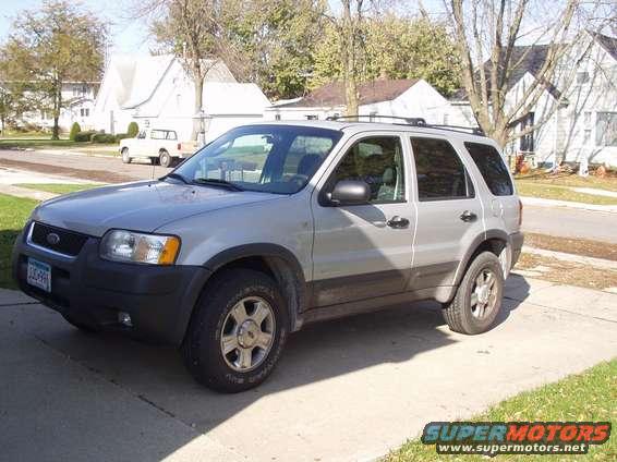 Silver 2002 Ford Escape parked on a driveway